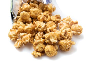 Close-Up of Heap of Caramelized Popcorn on White Background - 4K Ultra HD Image