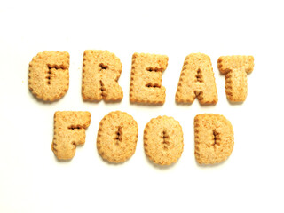 Word great food with letter made from cookie on white background.