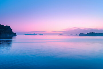 Fototapeta premium Serene sunrise over Bay of Islands New Zealand pastel colors painting sky calm waters below 