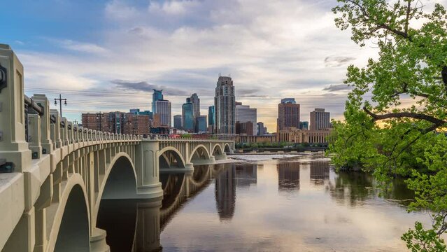 Minneapolis, Minnesota, USA downtown skyline on the Mississippi River with the Third Avenue Bridge