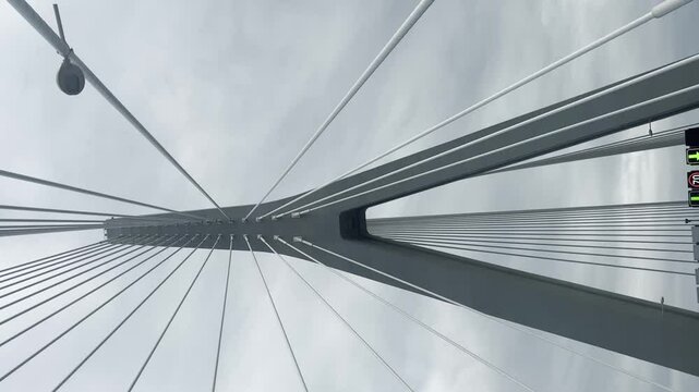 A bridge captured from a normal angle, then from a dramatic upward perspective