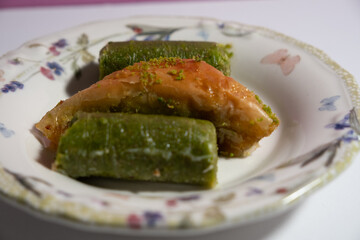 close-up pistachio baklava on a plate