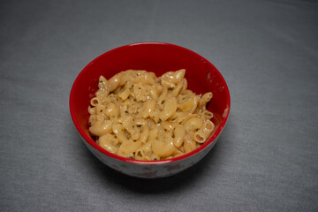 macro shot of macaroni with cheese	
