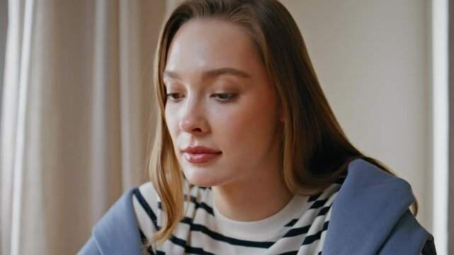 Portrait attractive woman nodding at work meeting. Professional communicate