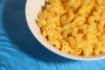 macro shot of macaroni with cheese	