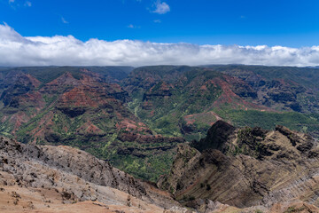 Waimea Canyon State Park, Kauai, Hawaii. Waimea Canyon, also known as the Grand Canyon of the Pacific, The canyon is carved into the tholeiitic and post-shield calc-alkaline lavas	