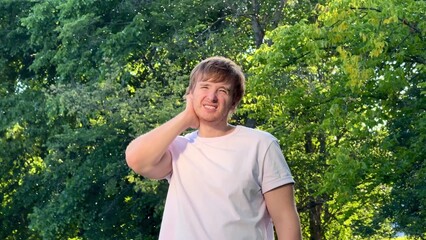 Fototapeta premium Young man suffering from mosquito bites in the forest