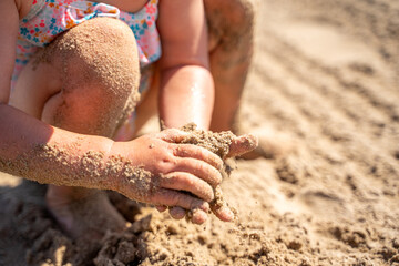 hands on the sand