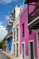 Naklejka premium Colorful house facades on cobbled street in historic Old San Juan, Puerto Rico