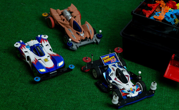South Kalimantan, Indonesia - 02 11 2024 : Mini 4WD Tamiya, Toy car and equipment box for playing mini 4WD