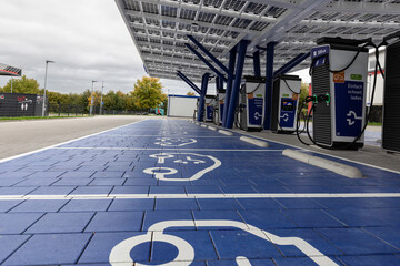Climate-Friendly EV Charging Station with solar panels on roof