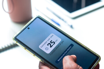 Man using wait time tracker mobile applications for convenience. Real-time approach for emergency services concept.