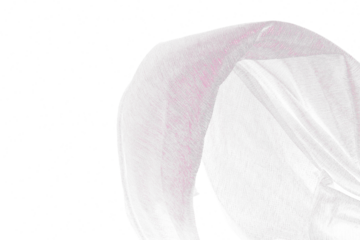 Purple Silver lace fabric flying in curve shape, Piece of textile purple silver lace fabric throw fall in air. Black background isolated, dark shading environment