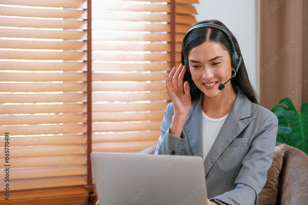 Aufkleber female call center operator or customer service helpdesk staff working on workspace while talking on