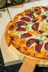 Deluxe sausage pizza