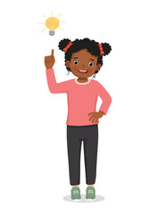 Fototapeta premium Cute little African gir got an idea pointing finger up with bulb light 