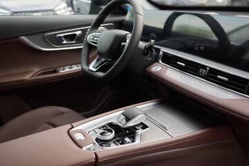 Vehicle with seating and steering wheel, interior design