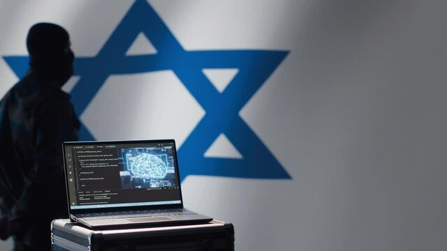 Israeli programmer making bot accounts on social networks using AI machine learning. Technician working for Mossad building artificial intelligence algorithms to spread fake news, camera A