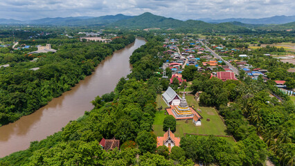 Aerial view of Nan river with Wat Phra Fang temple in Uttaradit province of Thailand. Built since...