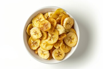Top view of dried banana chips or wafers isolated in a white bowl on a white background