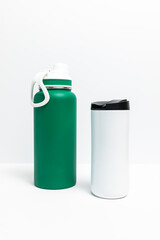 Isolated Reusable Sport Green and Water Bottles, Protein Shaker On White Background. Tumbler, Product Template. Travel Hiking Mug Vertical Plane.