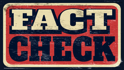 Fototapeta premium Aged vintage fact check sign on wood