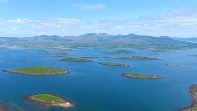 Aerial panorama of Clew Bay's archipelago of islands, partly drowned limestone drumlins formed by glacier. Aka Cuan Modha, one of nature's greatest spectacles when viewed from above. Co. Mayo, Ireland