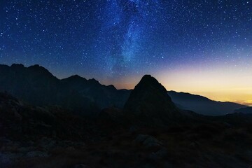 Fantastic starry sky with the Milky Way against the backdrop of the Canadian Rockies