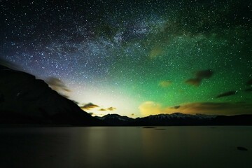 Fantastic starry sky with the Milky Way against the backdrop of the Canadian Rockies