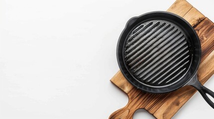 Top view of empty grill pan and chopping block on white background with space for text