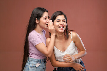 Image of Naughty Females Whispering Secret Or Interesting Gossip