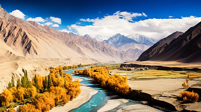 A river flows through a snowy mountain valley.
