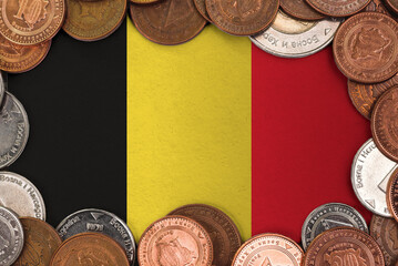 Coins on flag of Belgium . trading investment business currency concept
