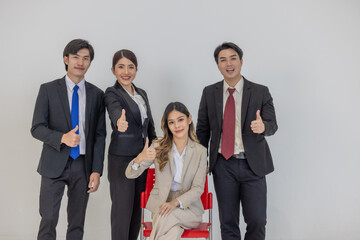 Professional Business Team standing against a plain background