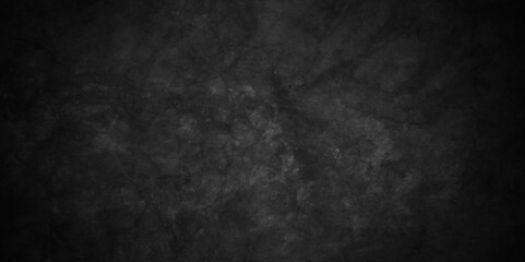 Abstract black stone wall texture grunge rock surface. dark gray background backdrop. wide panoramic banner. old wall stone for dark black distressed grunge background wallpaper rough concrete wall.