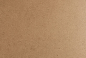 Cardboard brown background. Kraft paper texture sheet horizontal backdrop