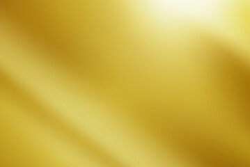 Abstract gold gredient metal color theme satin texture background. Lighting effects of flash. Blurred background with light glare.