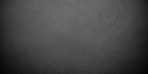 Abstract black stone wall texture grunge rock surface. dark gray background backdrop. wide panoramic banner. old wall stone for dark black distressed grunge background wallpaper rough concrete wall.