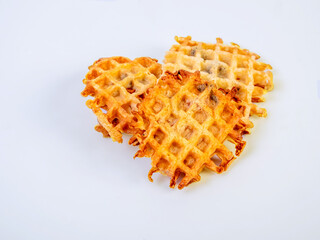 Homemade waffles. Soft waffles on a white background.