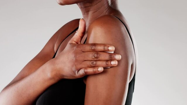 Close-up of African American Woman Applying Contraceptive Nicotine Patch
