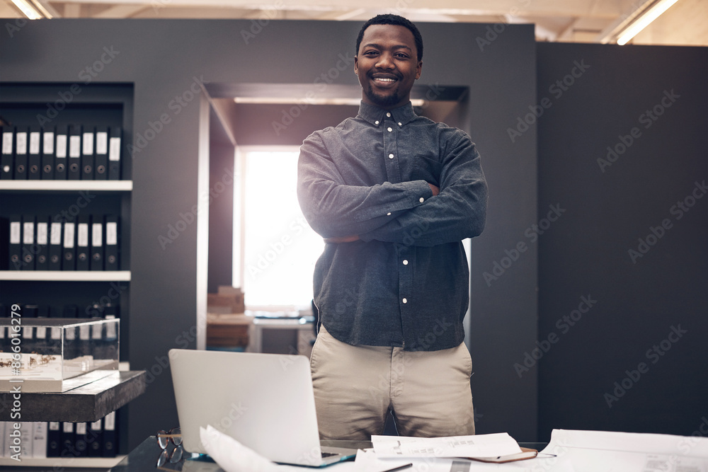 Sticker Documents, portrait and black man with arms crossed in office for development, progress and review. Happy, contractor and confident with laptop by paper for architecture, research and project plan