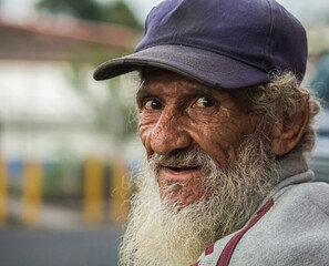 Portrait of a Smiling Senior Man with Cap