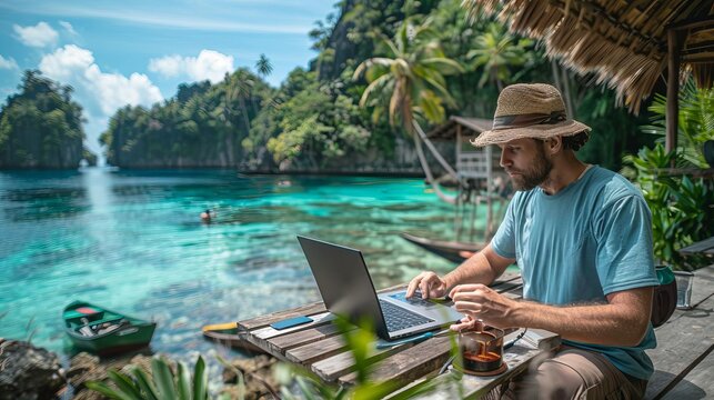 Enthusiastic travel blogger editing photos on a laptop, exotic location, rule of thirds