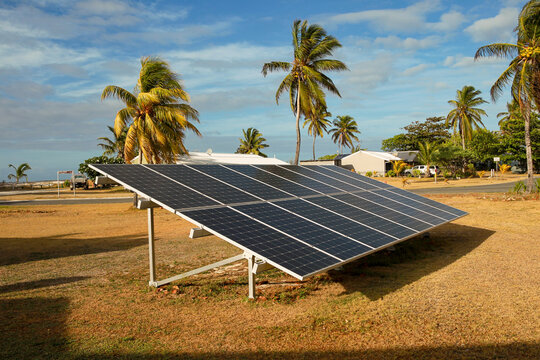 sixteen solar panels on frame on angle