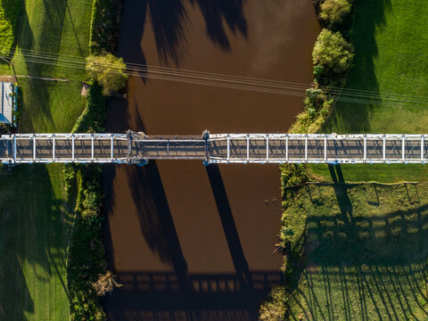 Overhead aerial view of heritage listed overhead-braced timber truss road bridge