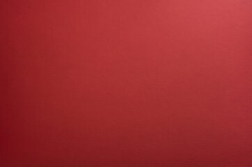 Simple and minimal plain solid red background with subtle texture surface