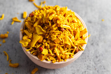 selective focus of Indian snacks Bombay Mix on a bowl. 