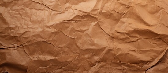 Obraz premium Textured brown paper with crumpled appearance creates a rustic vibe, suitable for copy space image.