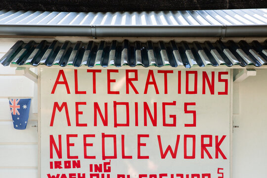 home made sign for an alterations business