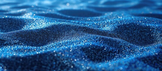 Textured blue sand background with copy space image.